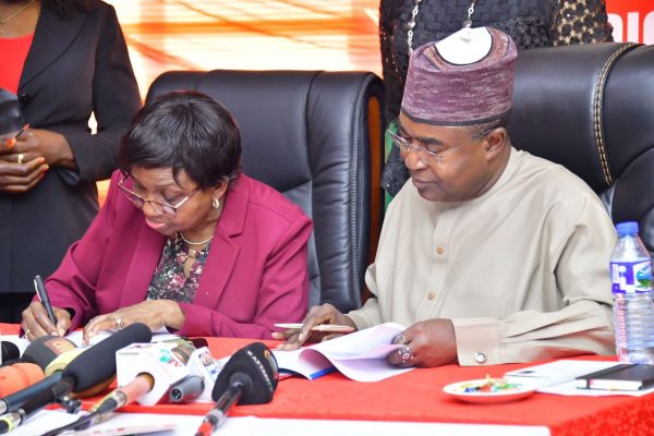 The Director General of NAFDAC, Prof Mojisola Adeyeye and Chairman of NDLEA, Brig Gen Buba Marwa, signing an Memorandum of Understanding as NLEAD partners NAFDAC in anti-drug war.